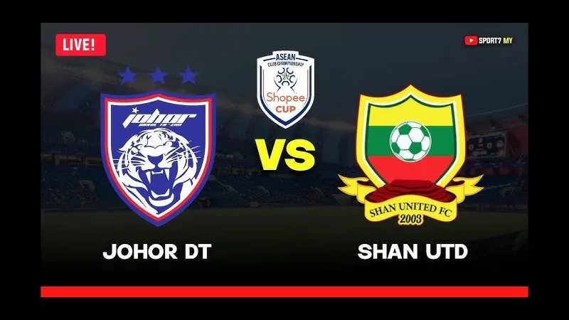 Cầu thủ Johor DT cản phá đường bóng của Shan Utd Cầu thủ Johor DT cản phá đường bóng của Shan Utd